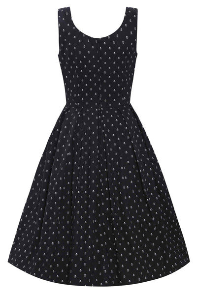 Back view of black skull print vintage style swing dress