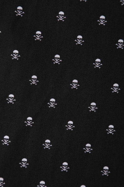 Close up fabric view of black skull print vintage style swing dress