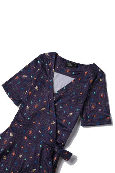 Close up View of Bug Collection Print Wrap Around Dress In Nave Blue