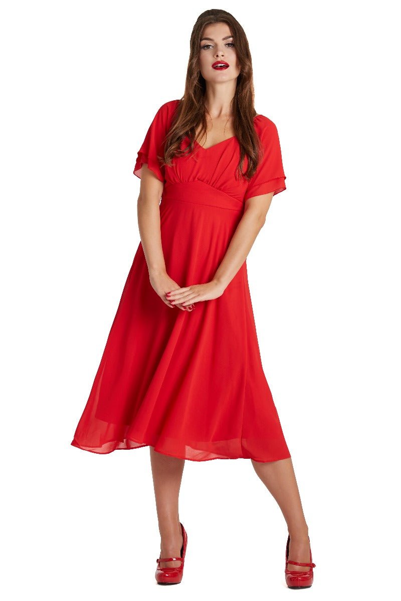Model wears our Meredith floaty casual dress, in red, front view