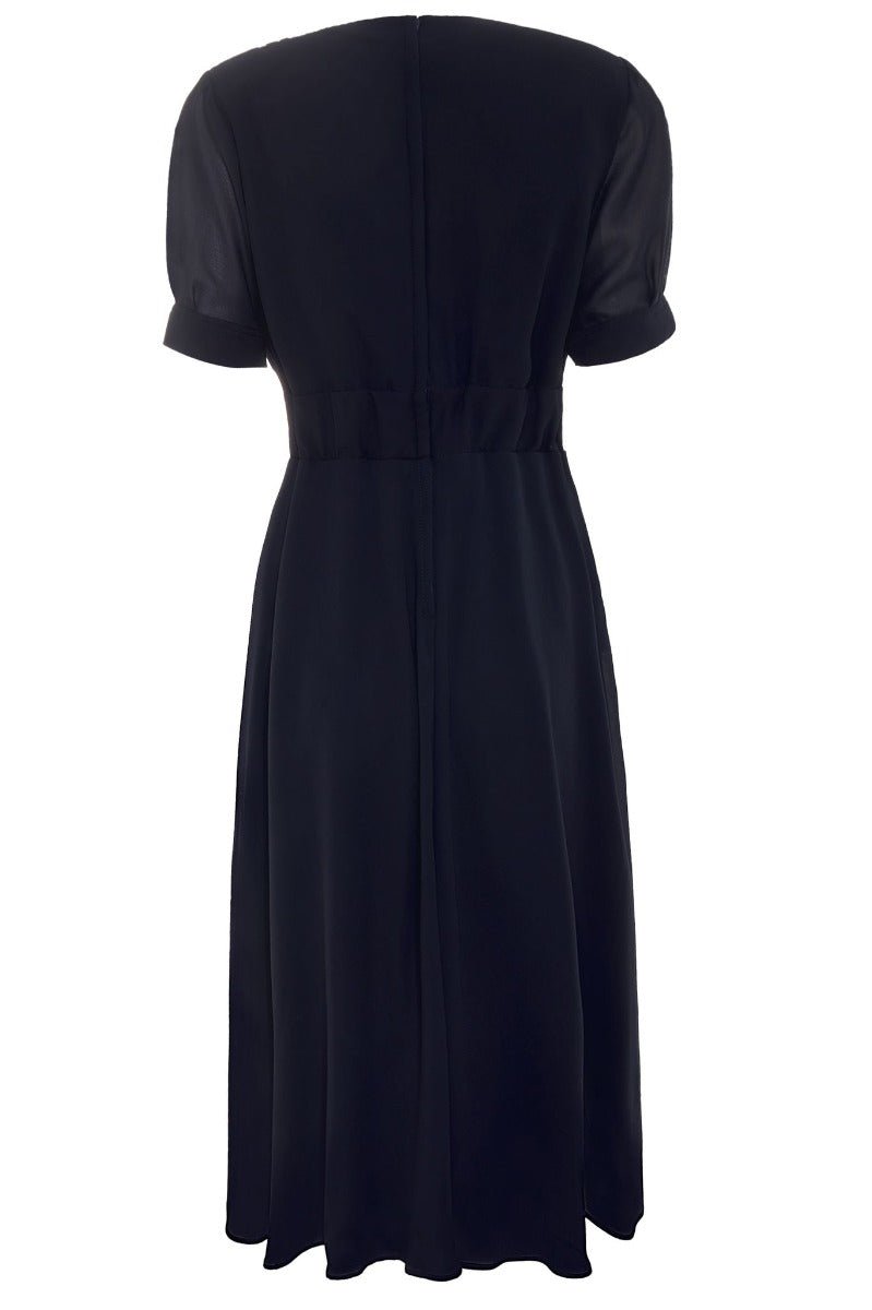 Elise 1940's casual day dress, in navy blue, back view