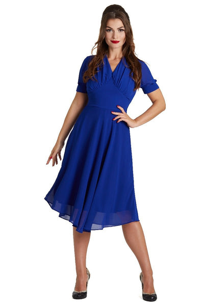 Model wearing our Elise 40's casual day dress, in dark blue, front view