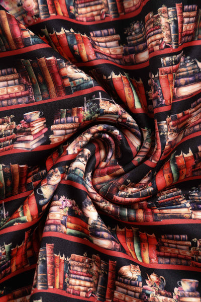Close up View of Cat and Book Swing Dress in Brown