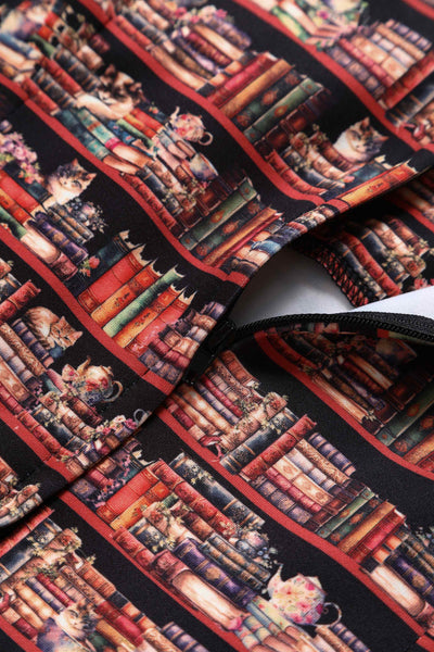 Close up View of Cat and Book Swing Dress in Brown
