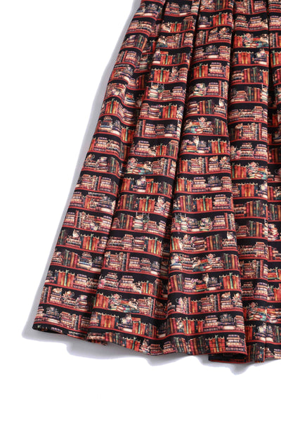 Close up View of Cat and Book Swing Dress in Brown