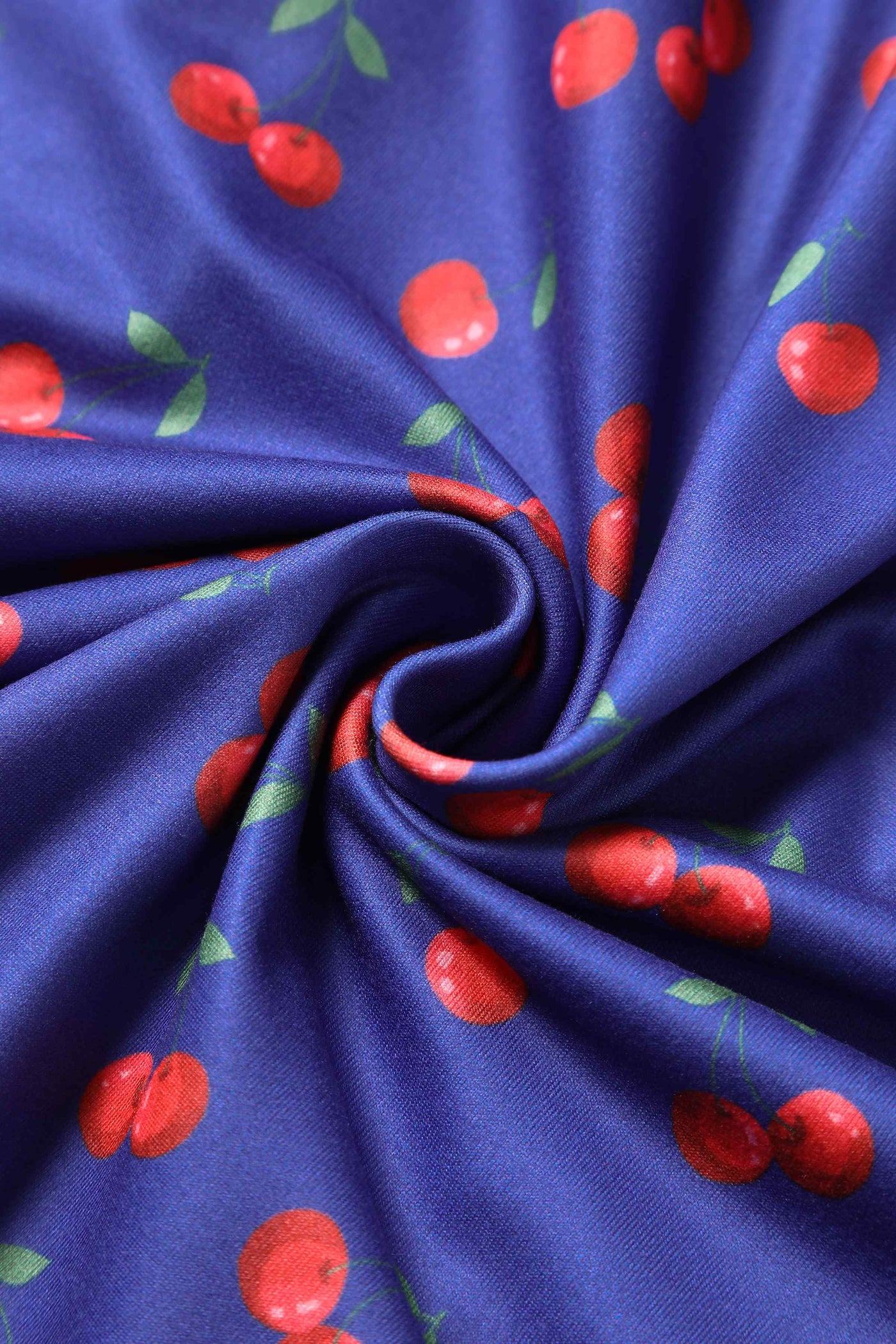 Close up view of Cherry Print Flared Dress in Blue