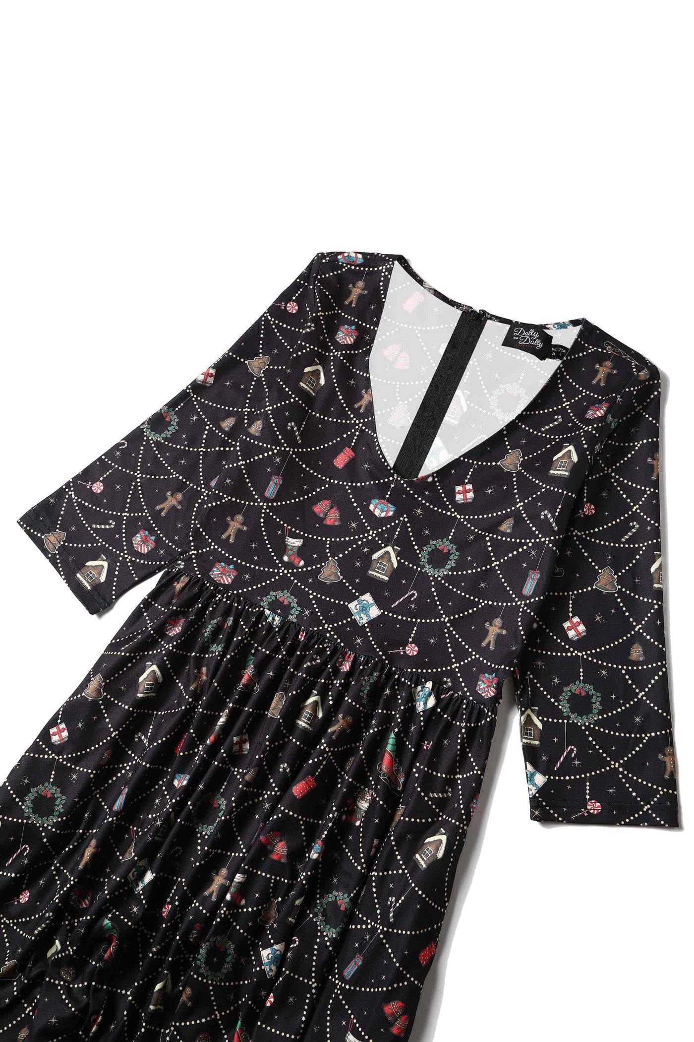 Front view of Christmas Print Long Sleeved Dress in Black