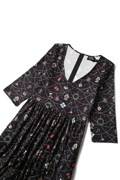 Front view of Christmas Print Long Sleeved Dress in Black