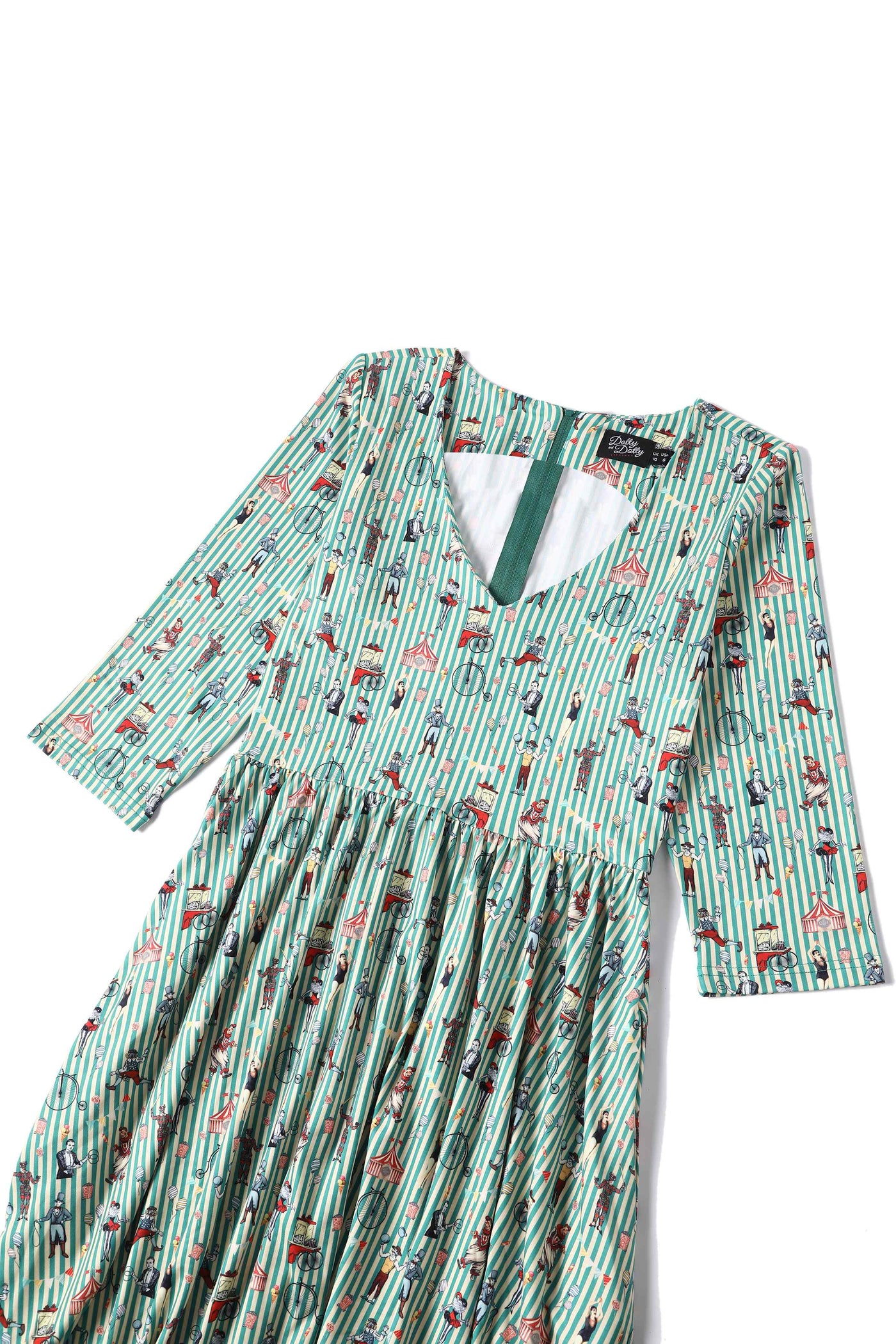 Close up View of Circus Print with Stripes Long Sleeved Swing Dress in Green