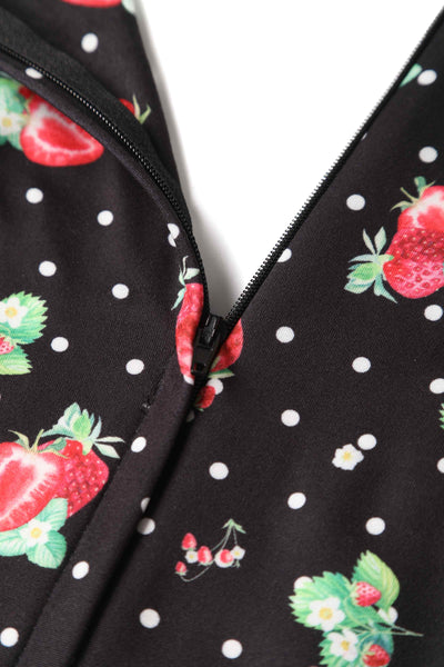 Close up of black strawberry print with zip
