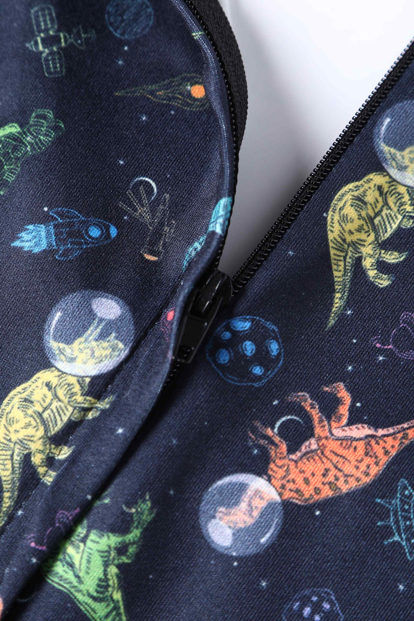 Close up view of Dinosaur In Space Long-Sleeved Dress in Navy Blue