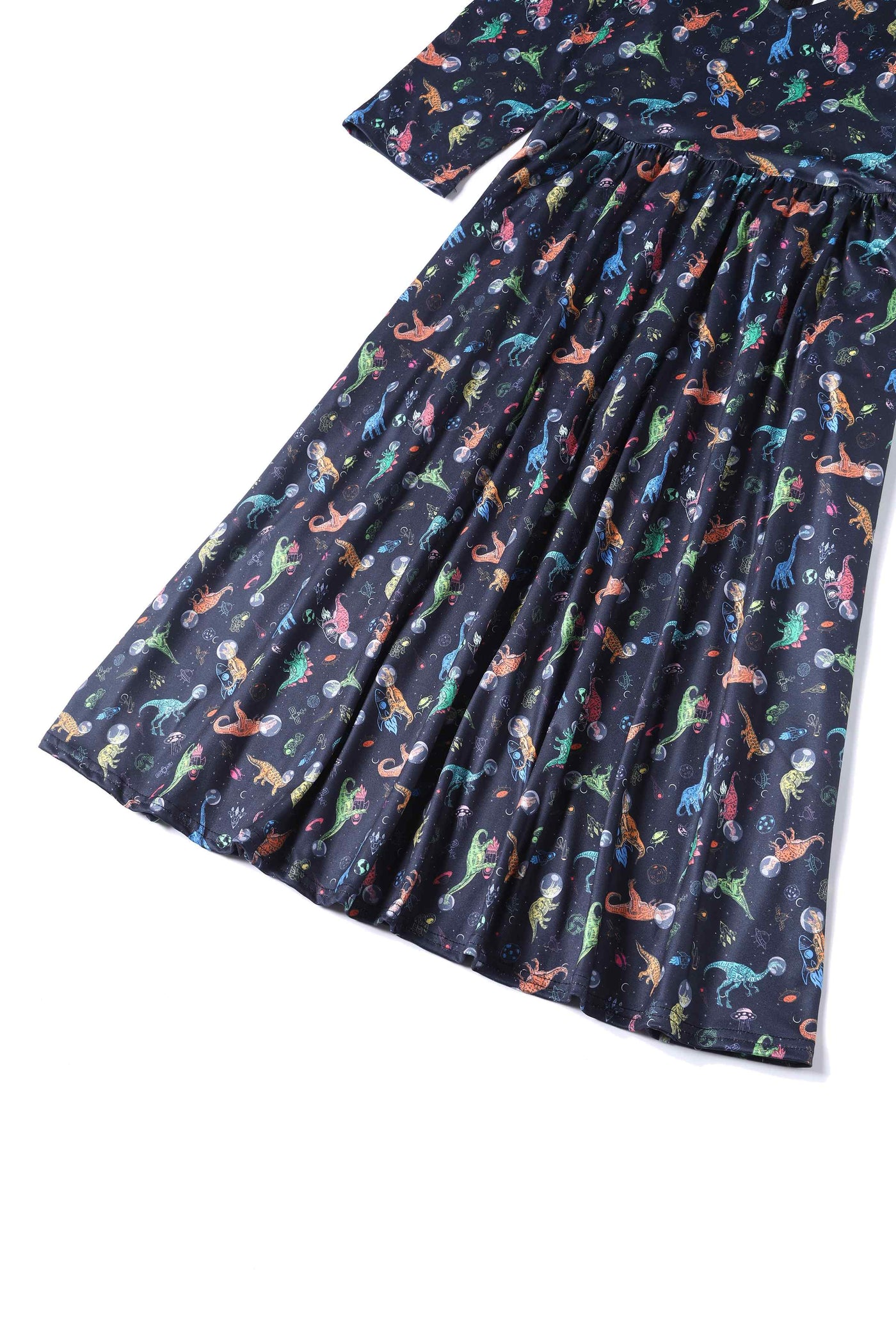 Close up view of Dinosaur In Space Long-Sleeved Dress in Navy Blue