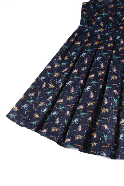 Close up view of Multi-coloured Dinosaurs in Navy Blue Flared Dress