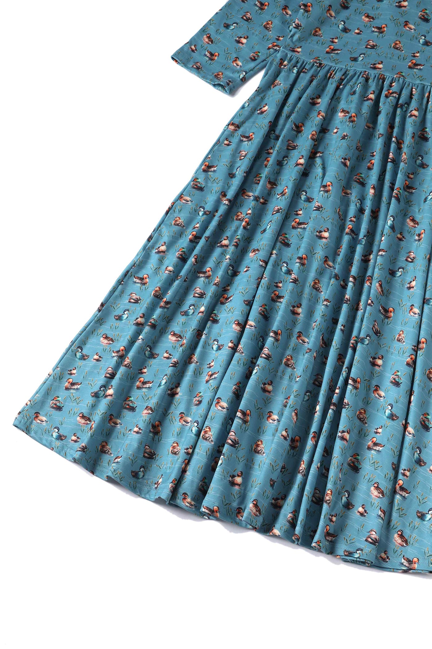 Close up View of Duck Print Long Sleeved Swing Dress in Blue