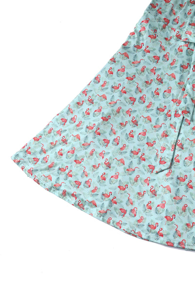 Close Up View of Flamingo Baby Blue Wrap Dress