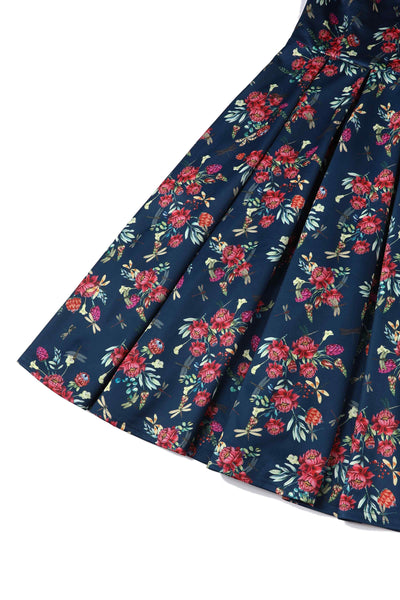 Close up view of Floral Dragonfly Print Off-Shoulder Dress in Navy Blue