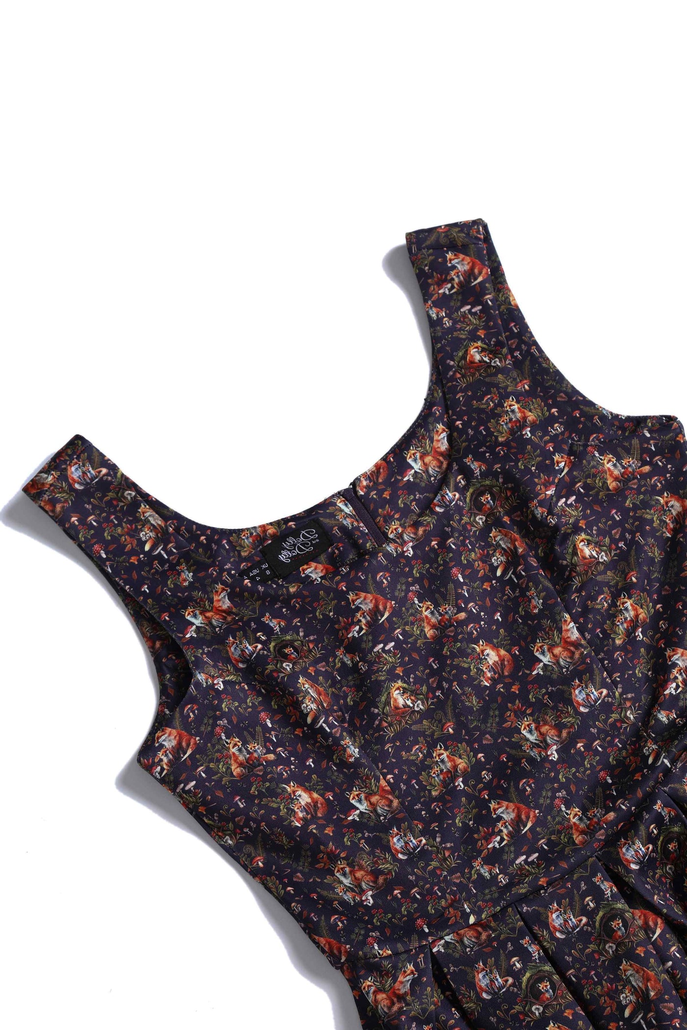 Close up View of Fox Den Print Sleeveless Swing Dress in Purple