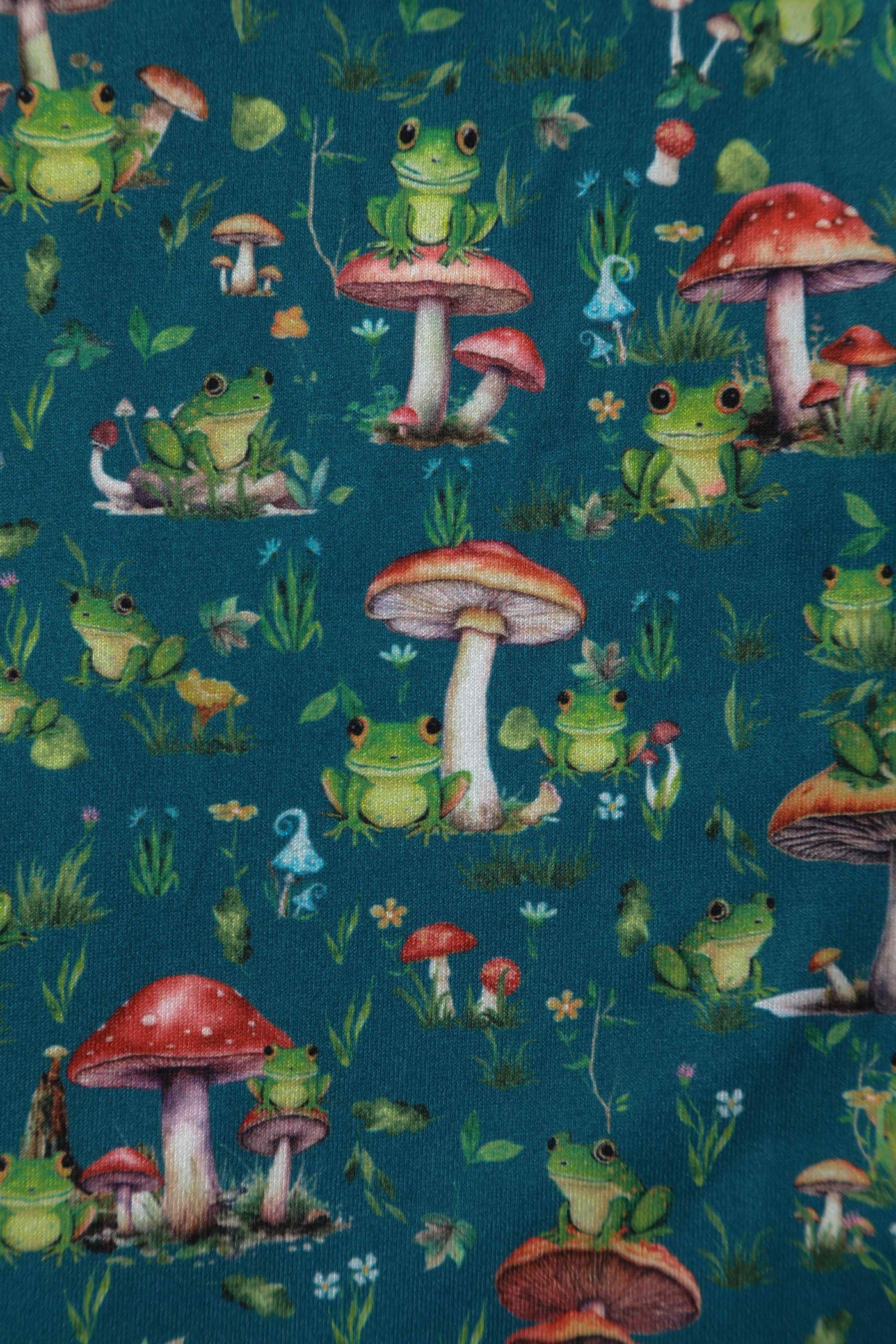 Close up view of Frog and Mushroom Print Dress in Green