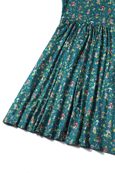 Close up view of Frog and Mushroom Print Dress in Green