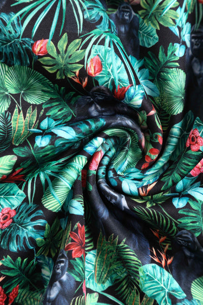 Close up View of Gorilla Forest Print Swing Dress in Green 
