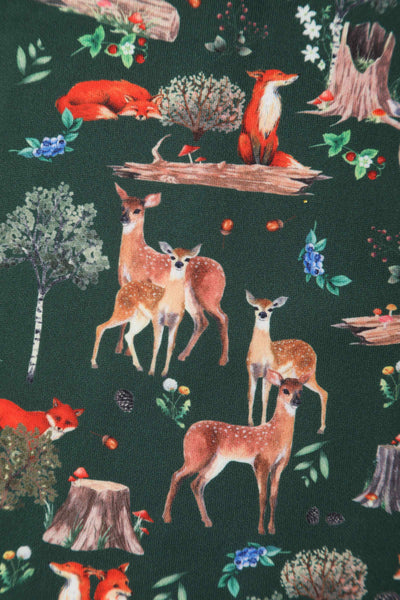 Fabric Close Up view of green woodland fox and deer print sleeveless swing dress