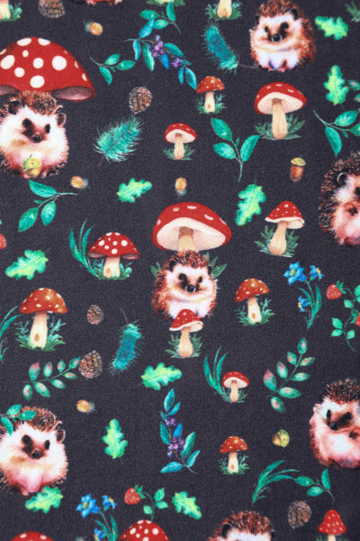 Close up view of Hedgehog and Mushroom Print Dress in Black