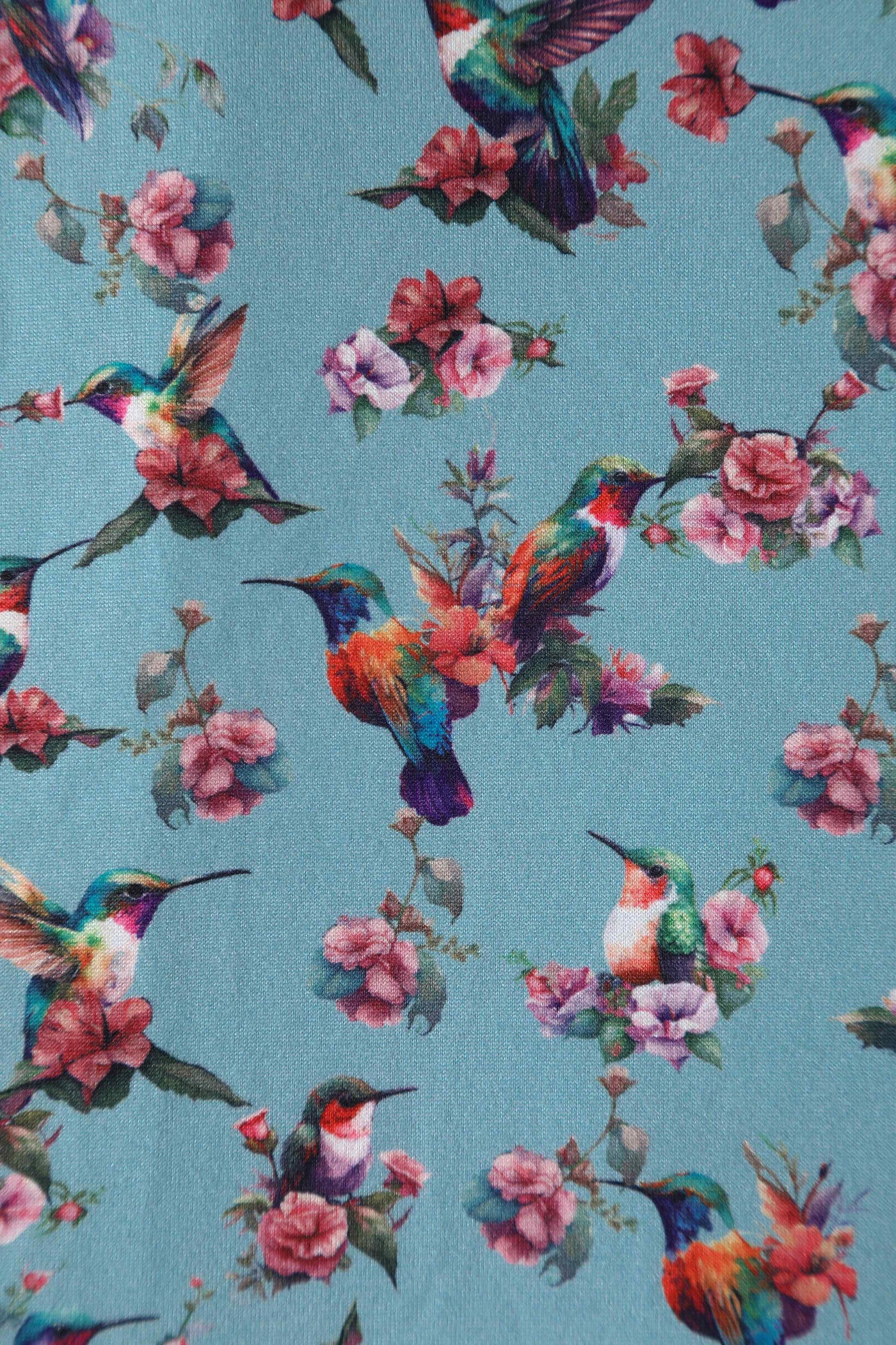 Close up View of Hummingbird Blue Wrap Dress