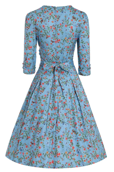 Back view of Hummingbird Print Long Sleeved Dress in Blue