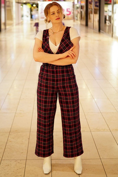 Influencer wearing blue red tartan jumpsuit