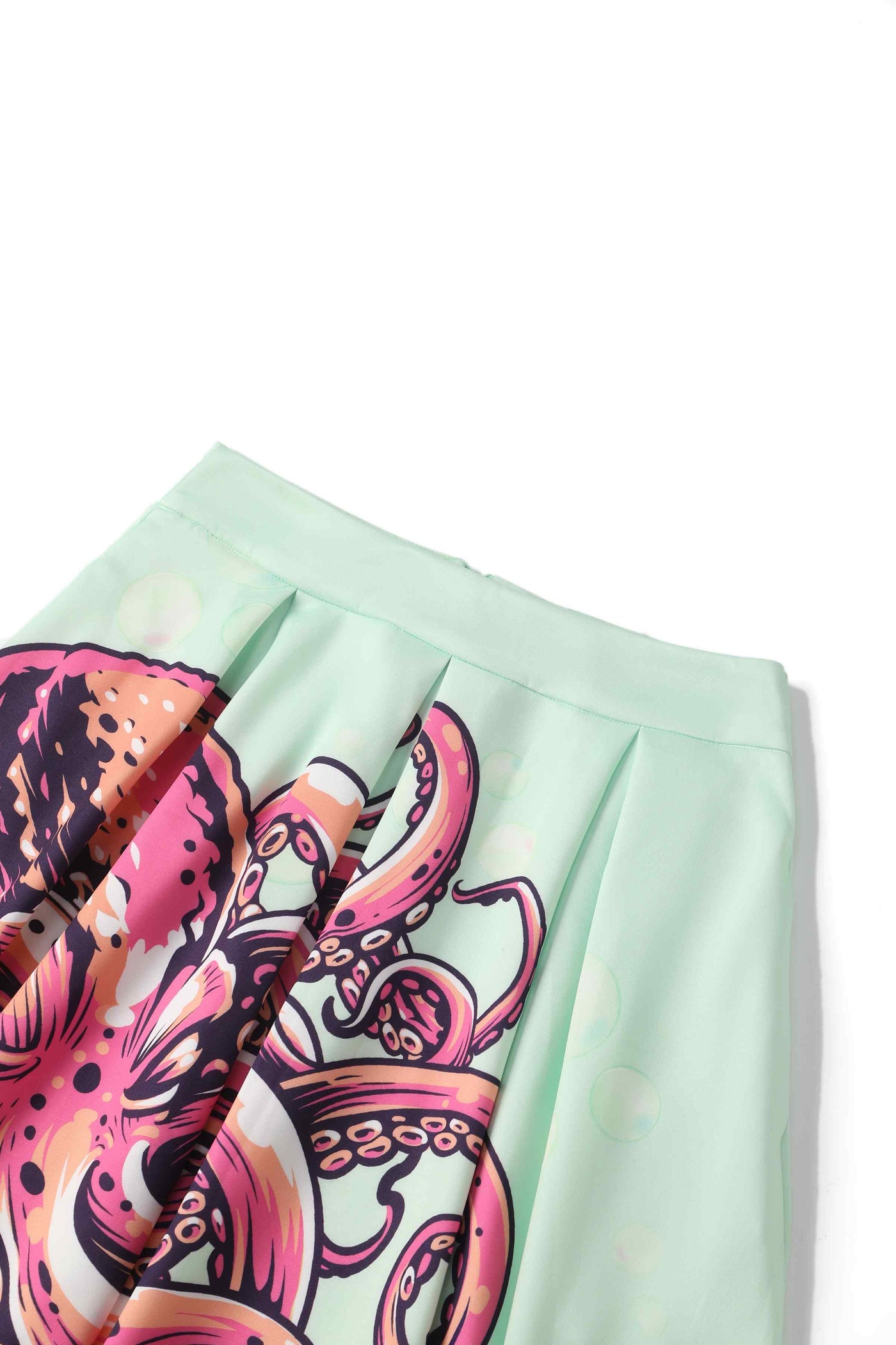 Close up View of mint green with octopus print box pleated skirt