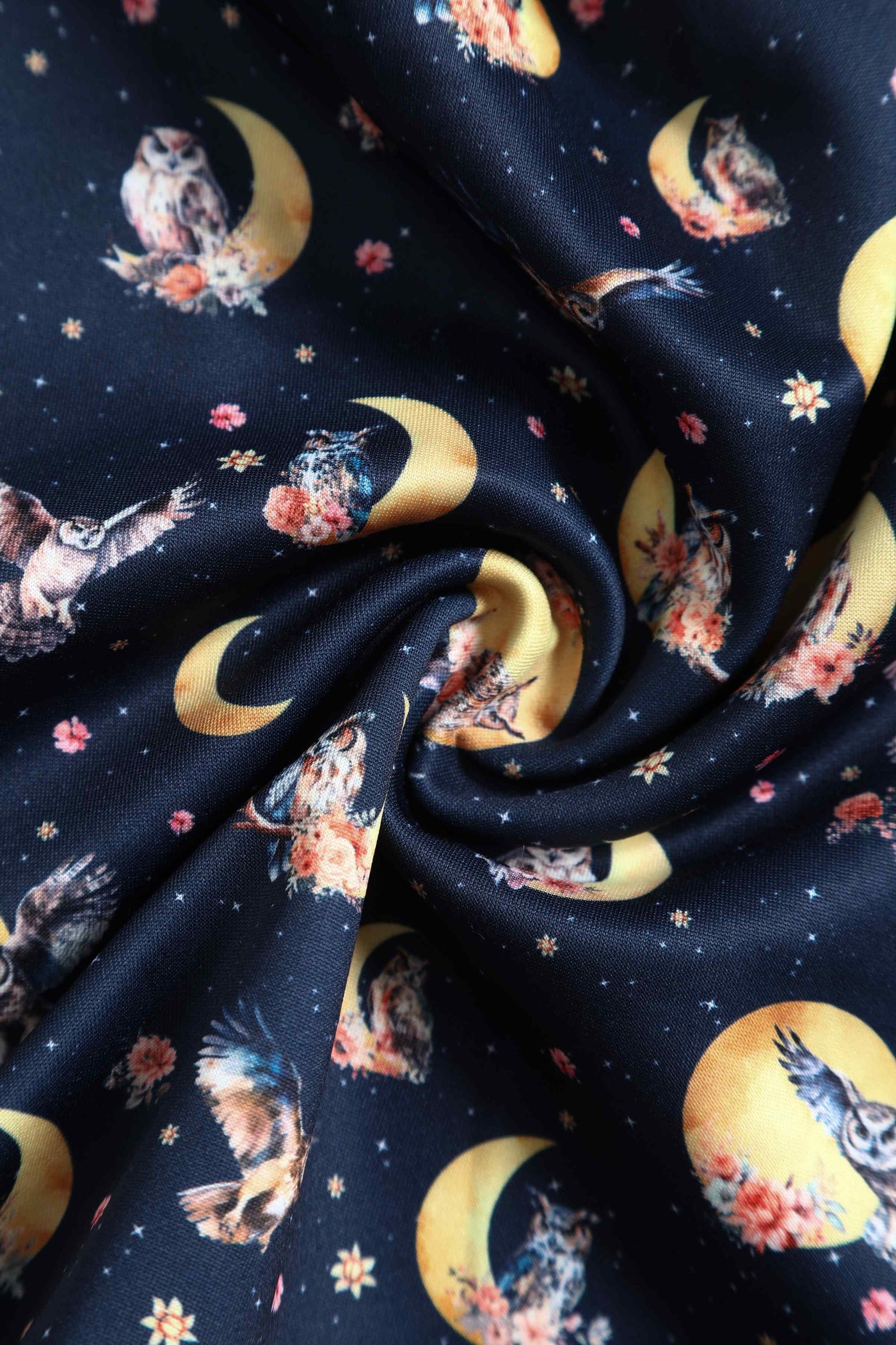 Close up View of Night Owl Print Sleeveless Swing Dress in Navy Blue