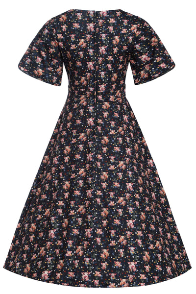 Back view of Pig Print Petal Sleeved Dress in Black
