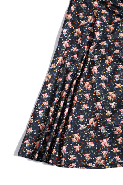 Close up view of Pig Print Petal Sleeved Dress in Black