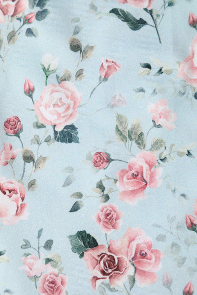 Close up view of Pink Rose Print Flared Dress In Baby Blue