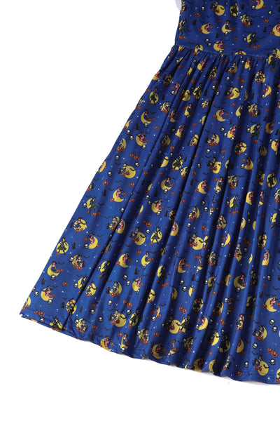 Close Up View of Pinup Witch Print Long Sleeved Dress in Blue