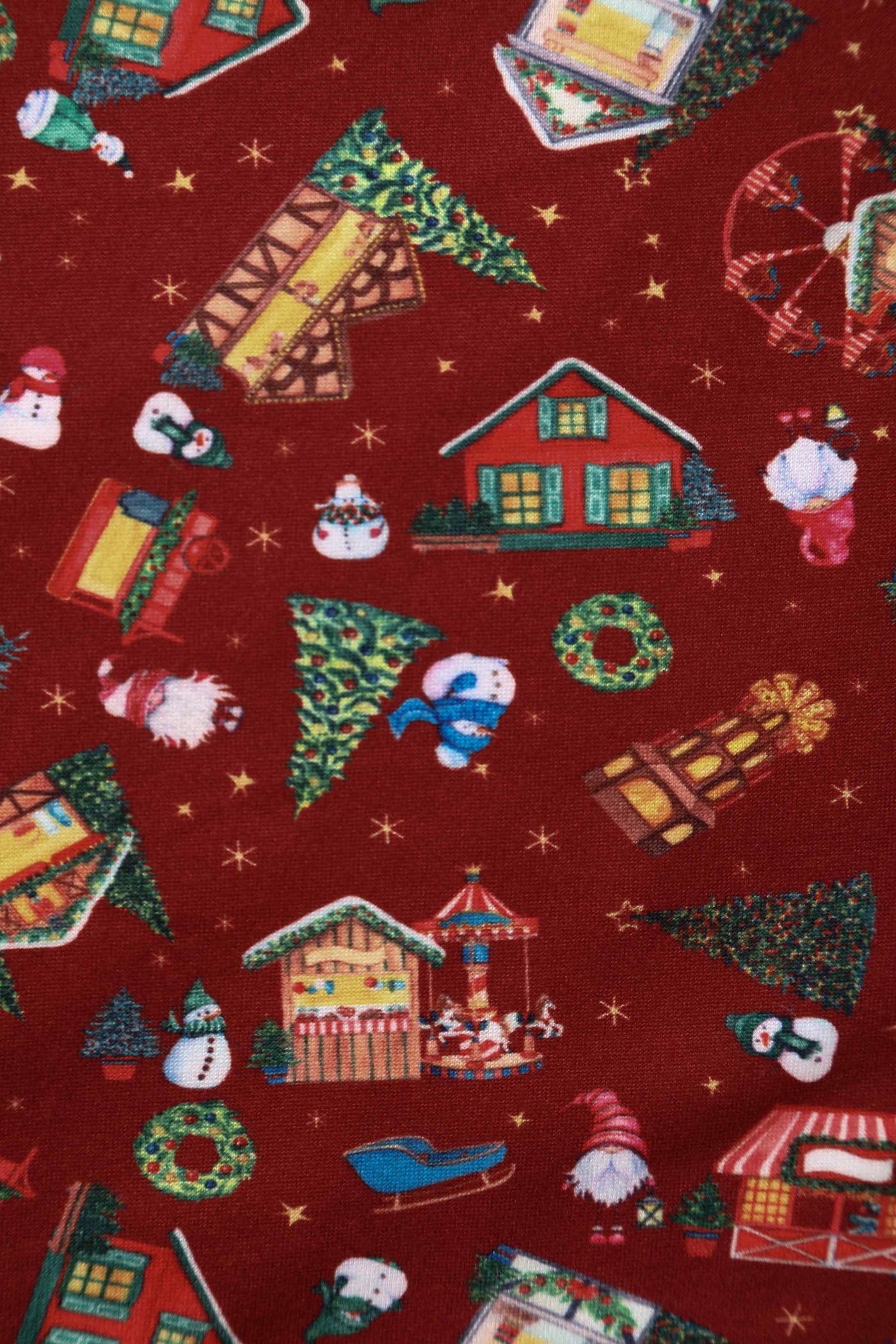 Close up fabric View of red christmas fair print long sleeved swing dress