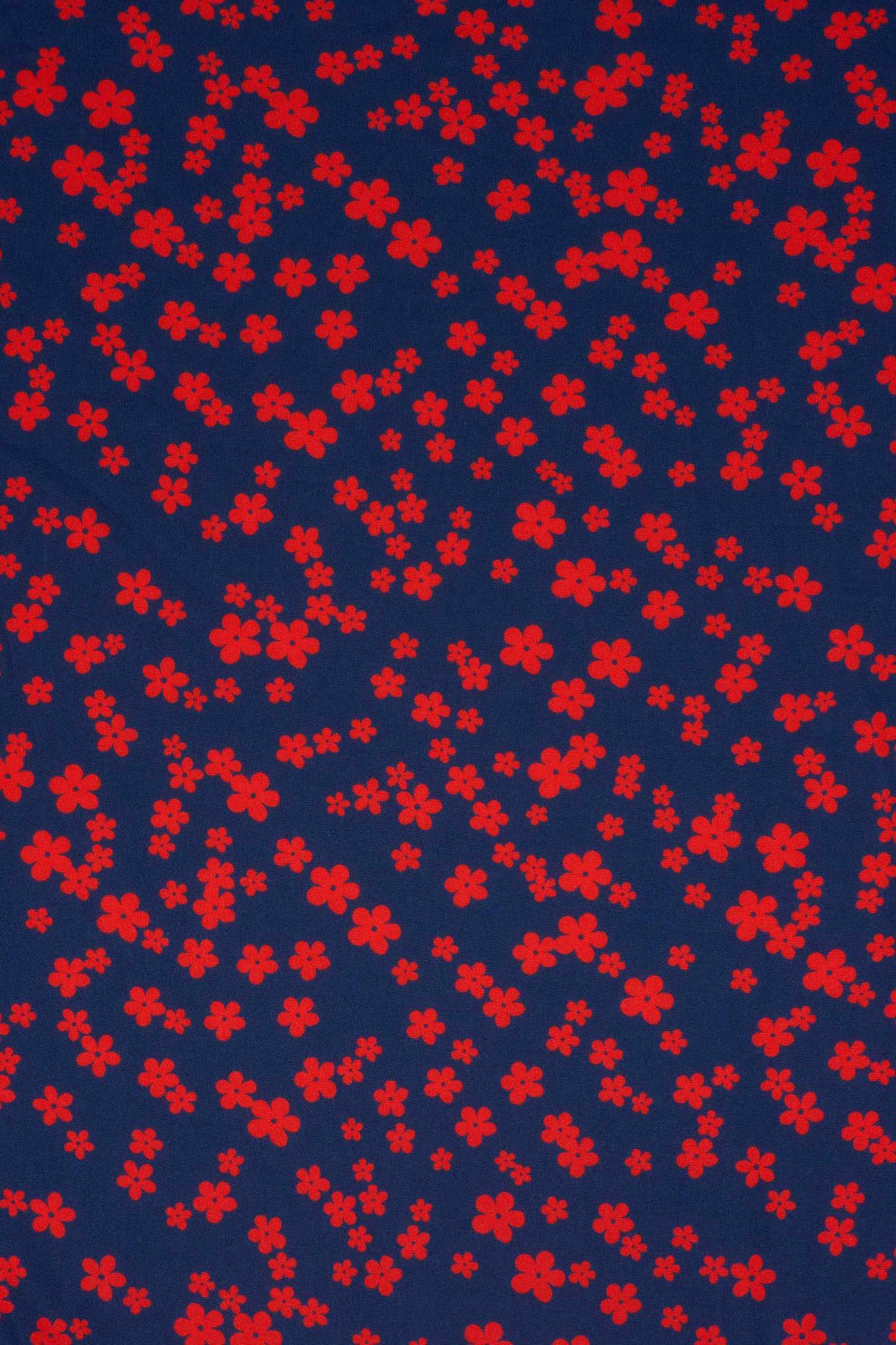 Close up View of Red Ditsy Floral Petal Print Sleeve Dress in Navy Blue