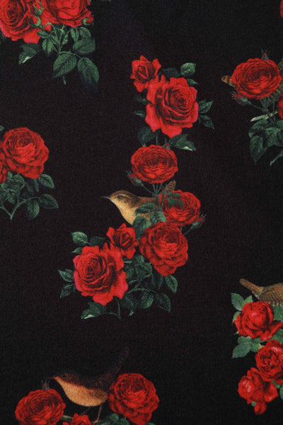 Close up View of Red Rose Print Crossover Bust Dress in Black