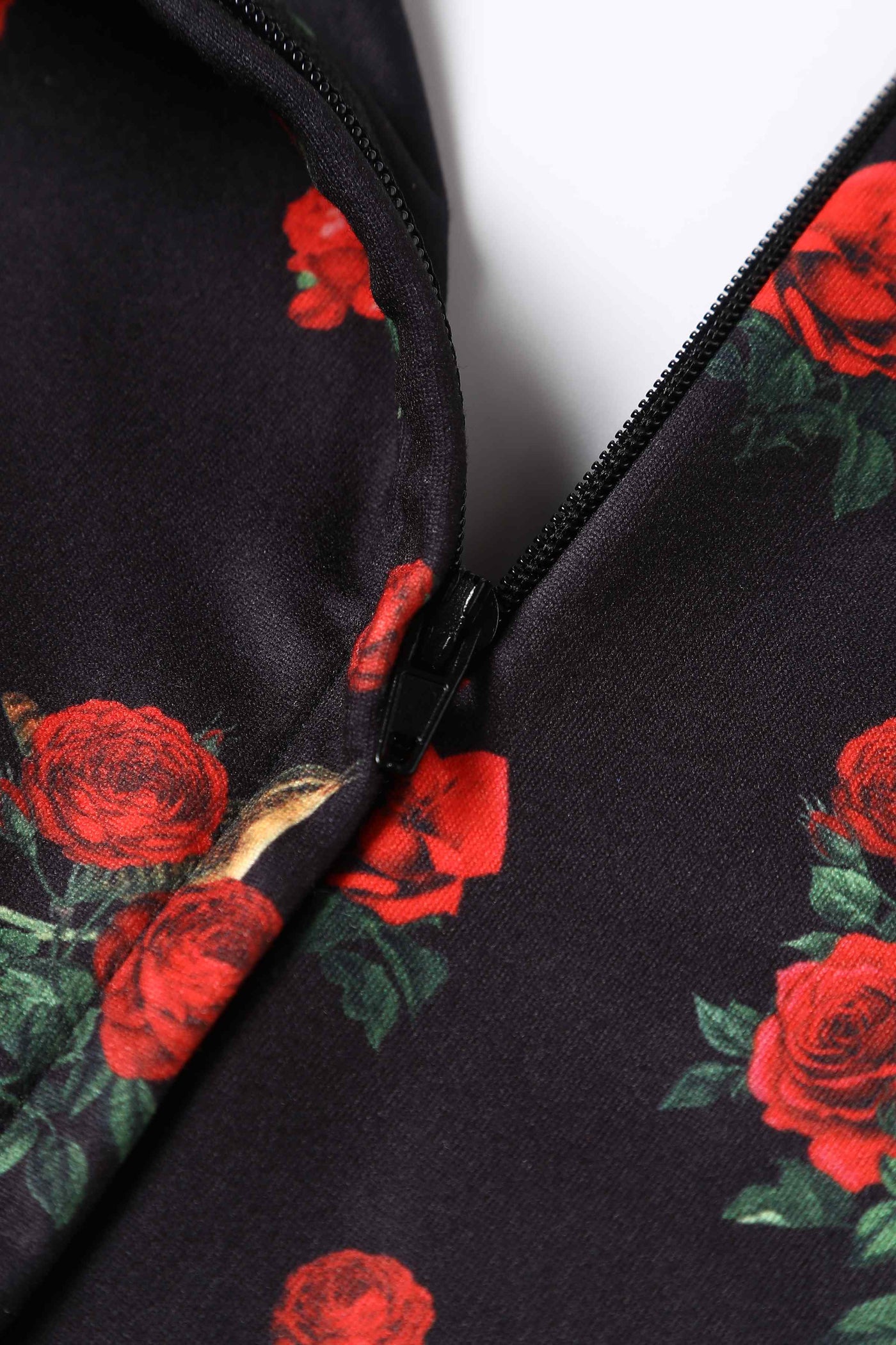 Close up View of Red Rose Print Crossover Bust Dress in Black