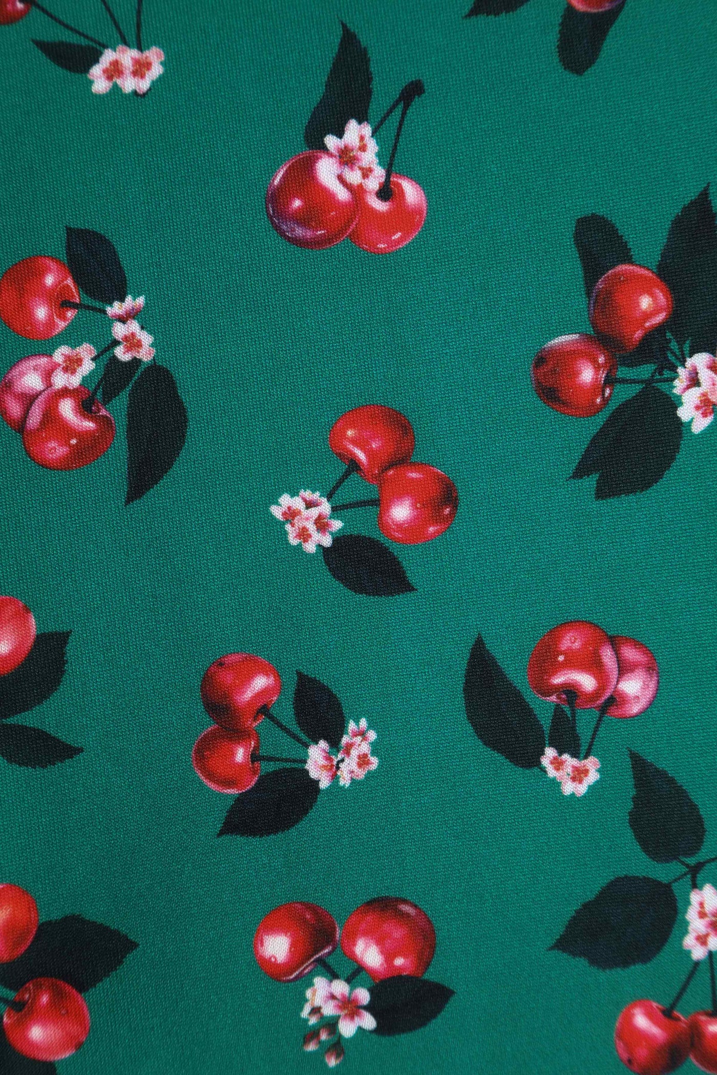 Close up View of Retro Cherry Emerald Green Midi Dress