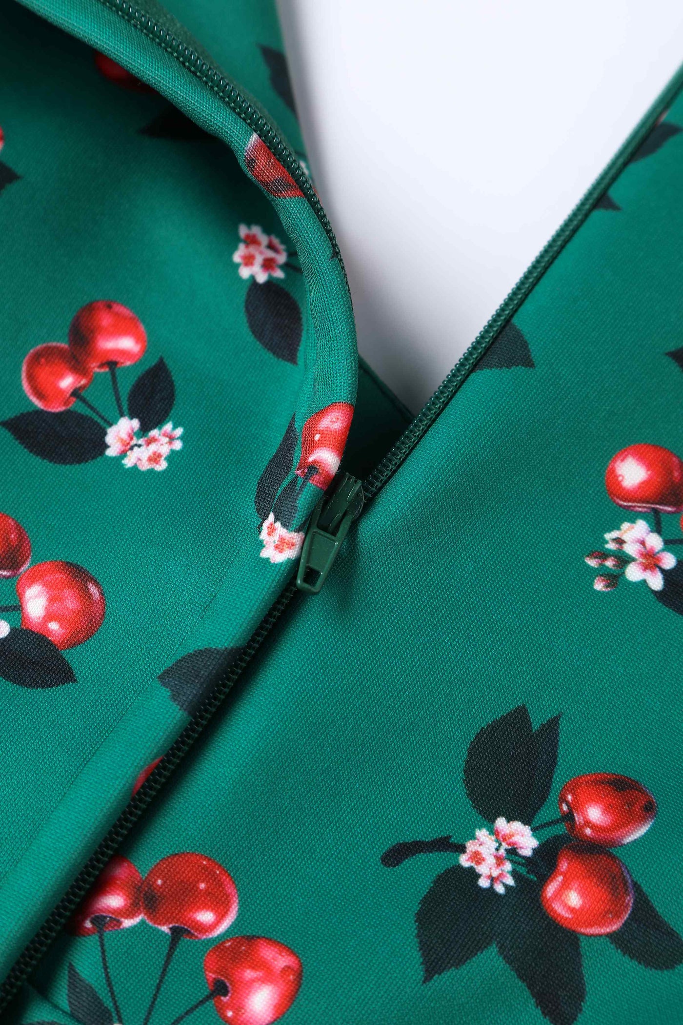 Close up View of Retro Cherry Emerald Green Midi Dress