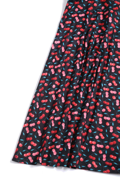 Close up View of Retro Cherry Print Crossover Bust Dress in Black