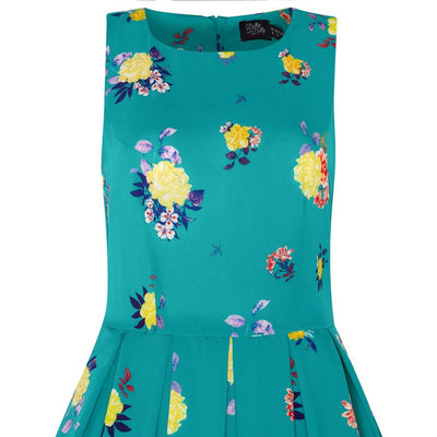 Close up view of Raising Flower Swing Dress in Turquoise
