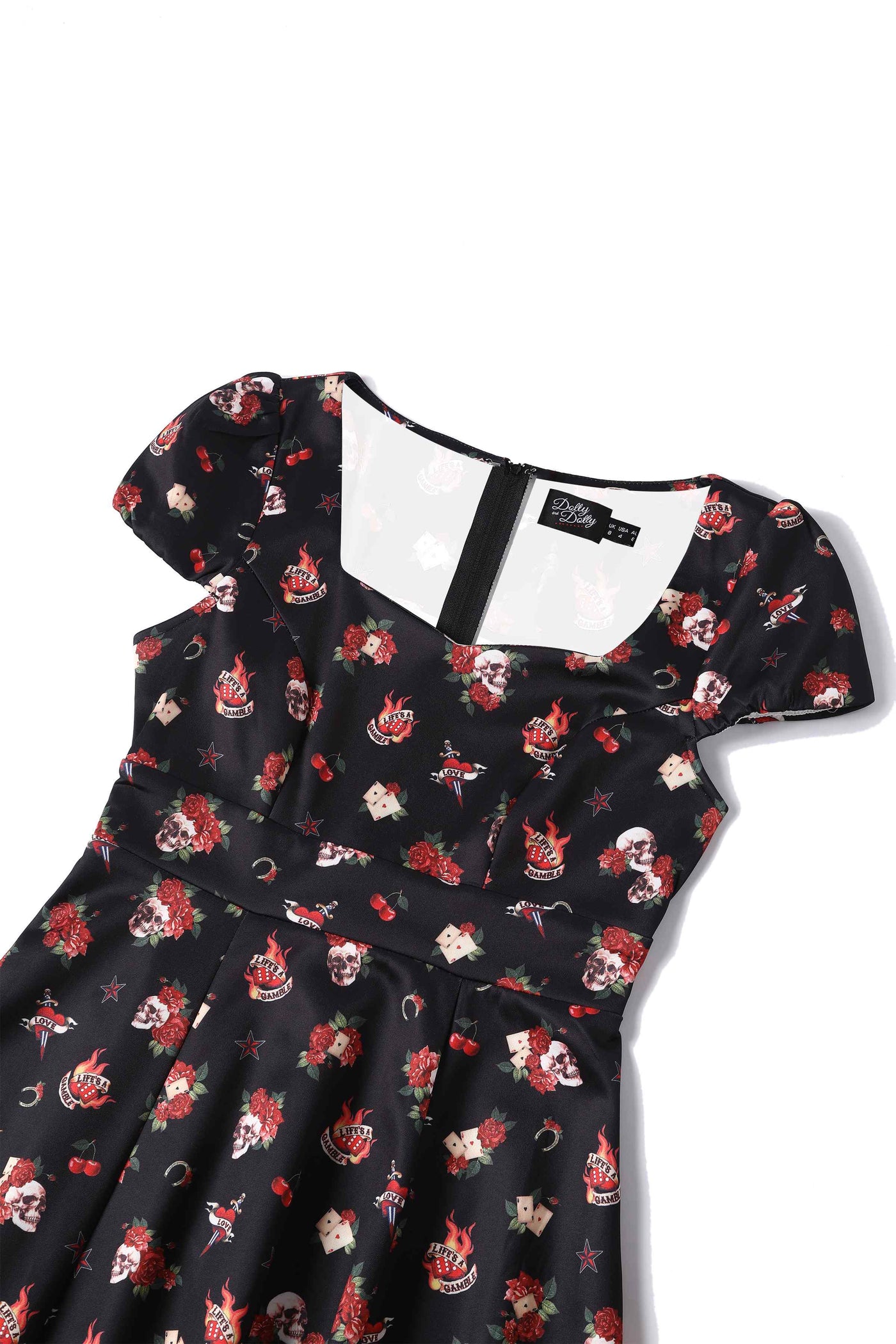 Close up view of Rockabilly Skull and Rose Print Dress in Black