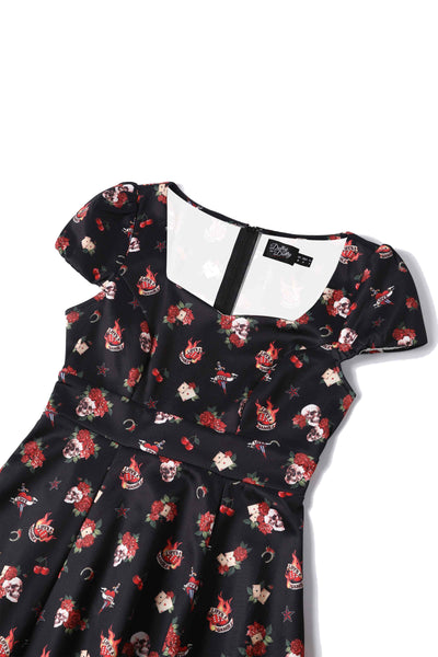Close up view of Rockabilly Skull and Rose Print Dress in Black