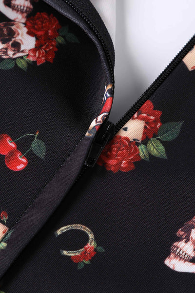 Close up view of Rockabilly Skull and Rose Print Dress in Black
