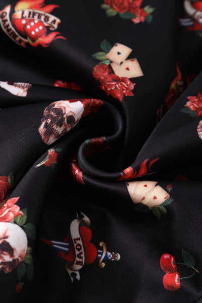 Close up view of Rockabilly Skull and Rose Print Dress in Black