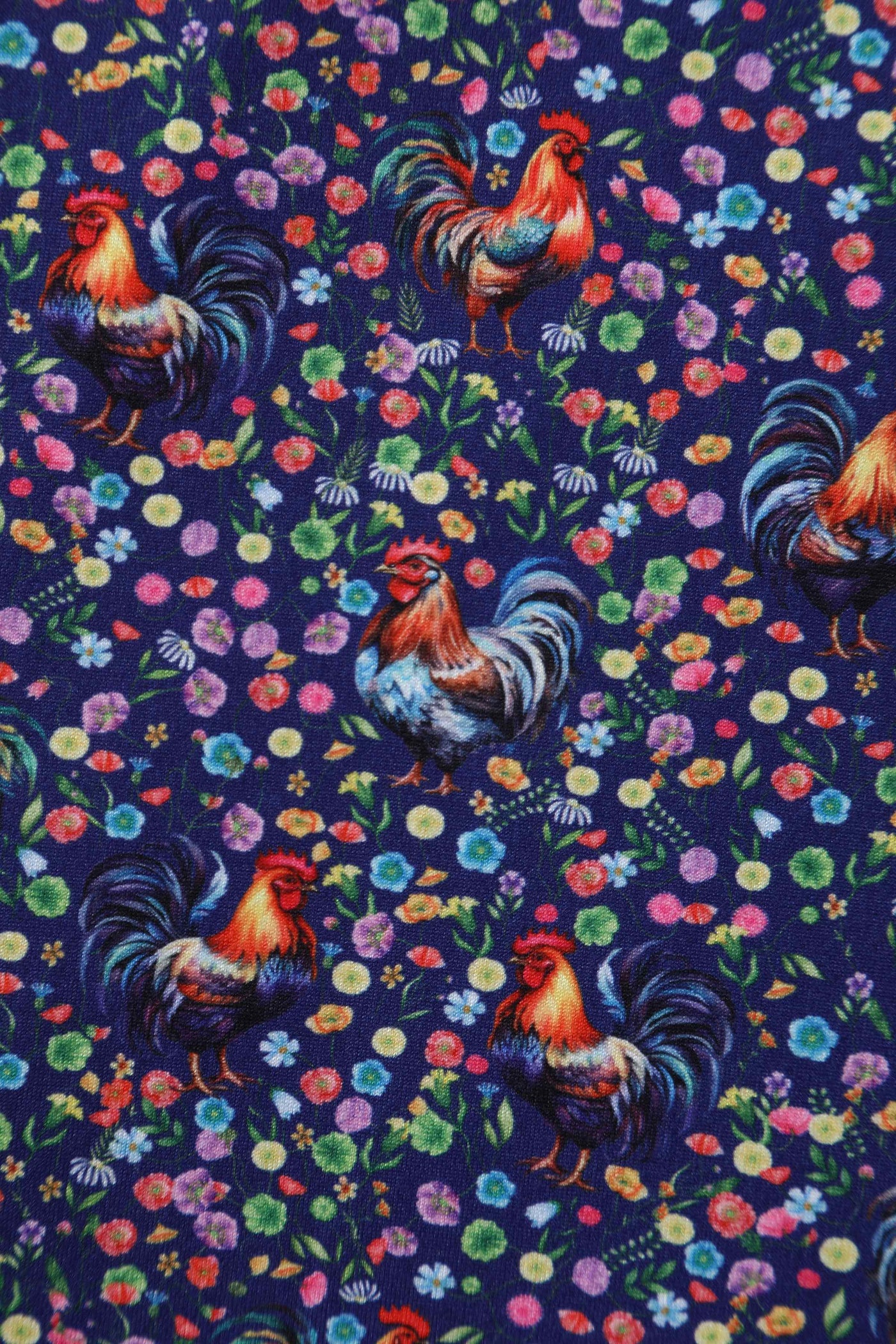 Purple fabric, with rooster chickens and flowers