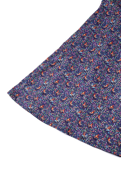 Short sleeved tea dress in purple rooster chicken and flowers print, skirt view