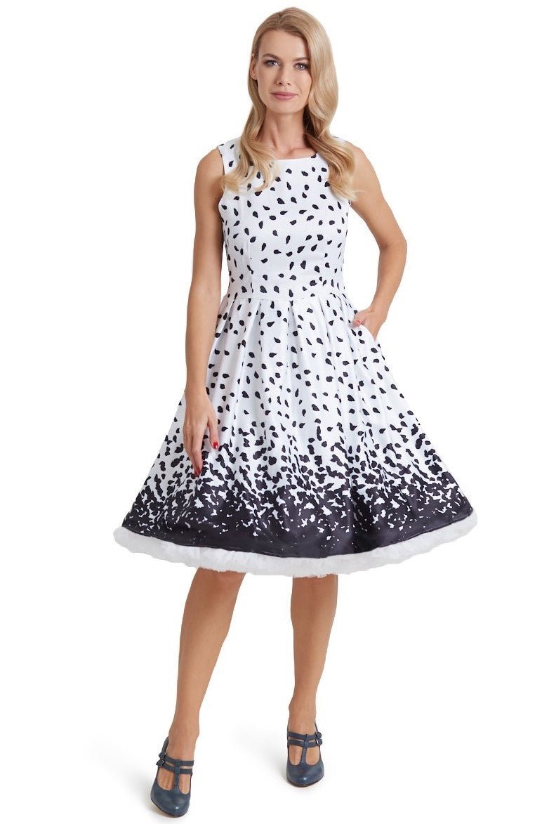 Model wearing our white Annie swing dress, with black brush strokes, front view
